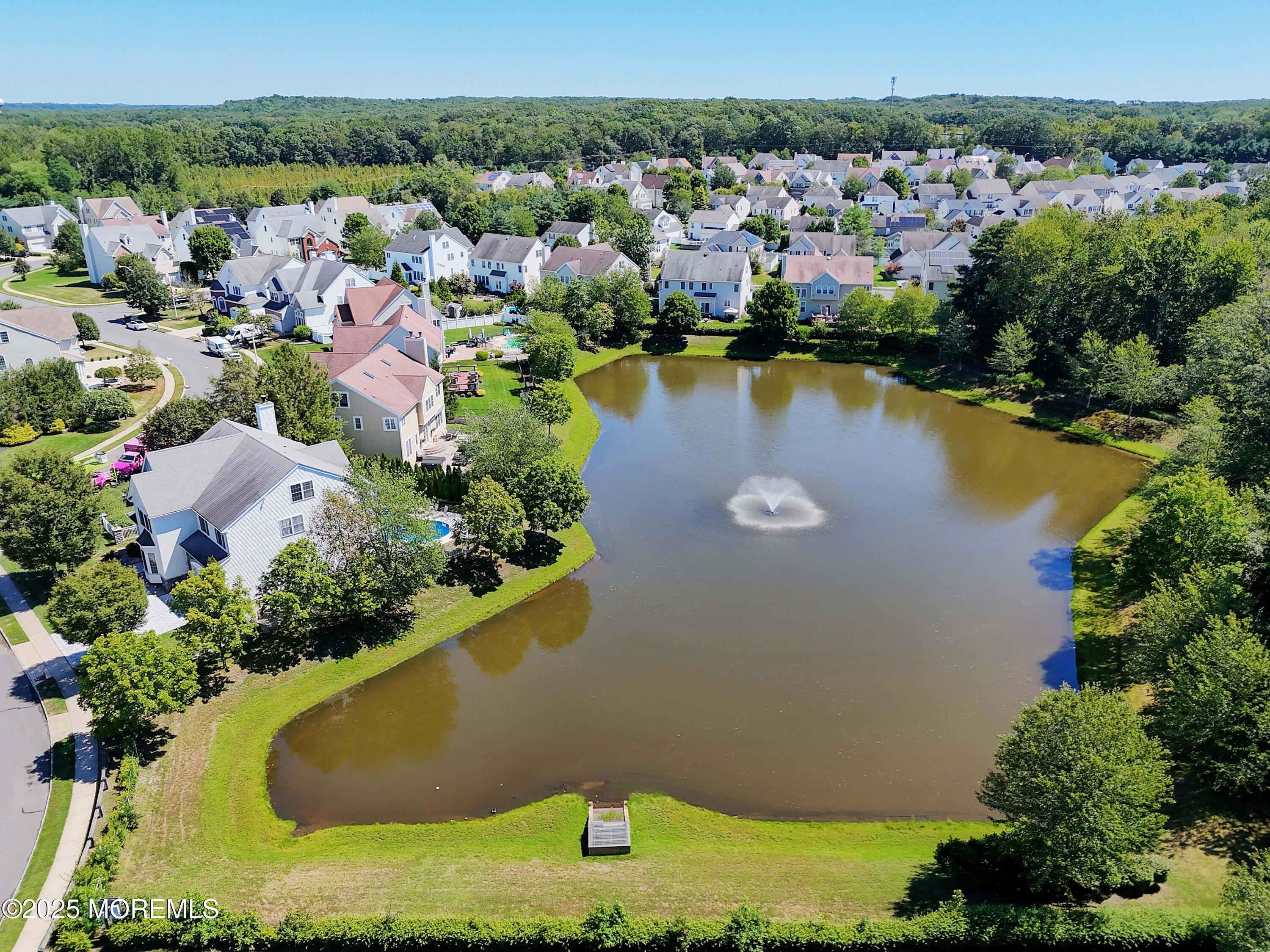 32 Firestone Drive Howell, NJ 07731 - Photo 42 of 43 an aerial view of residential houses with outdoor space and lake view