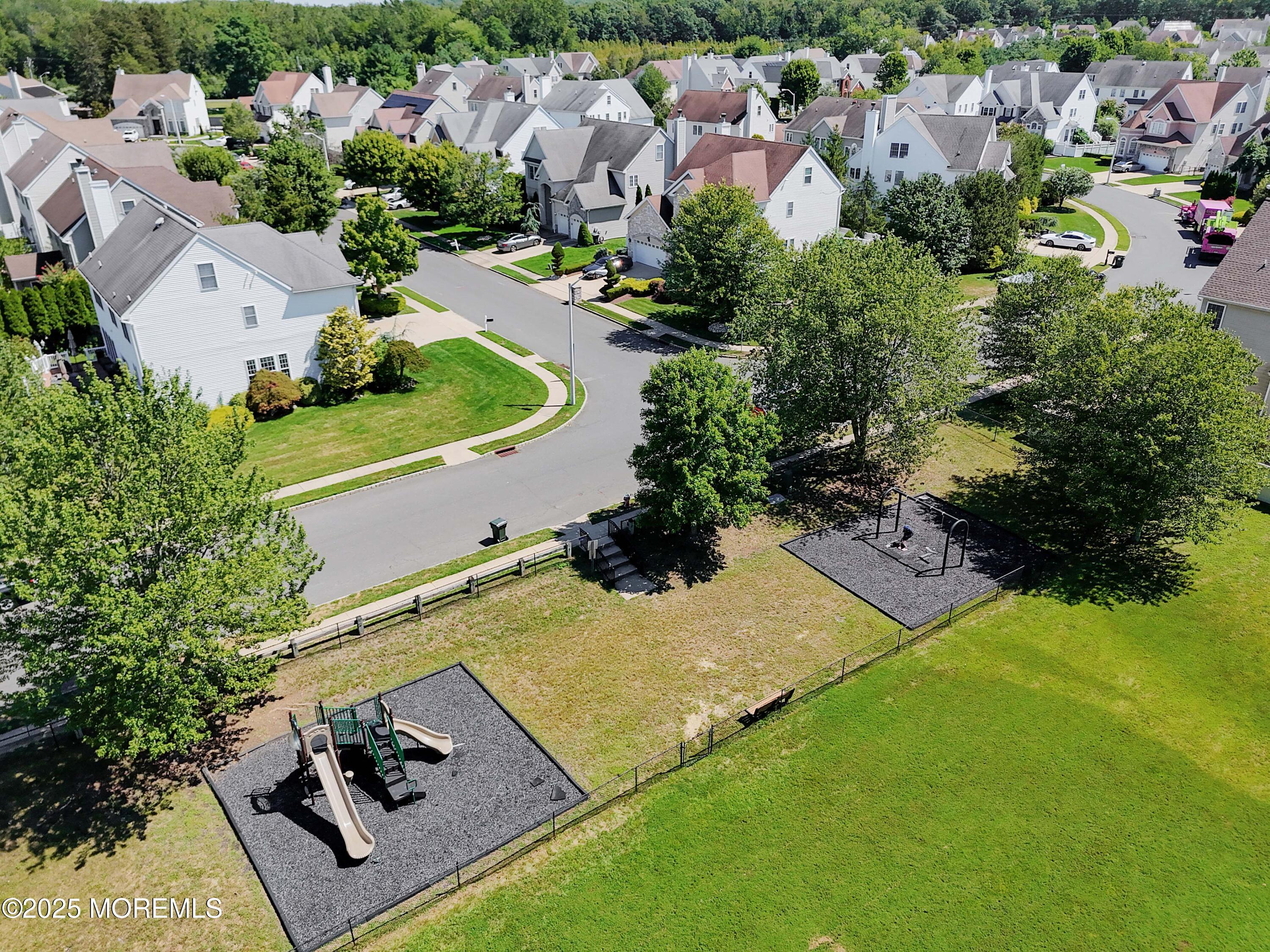 32 Firestone Drive Howell, NJ 07731 - Photo 43 of 43 an aerial view of a house with a yard
