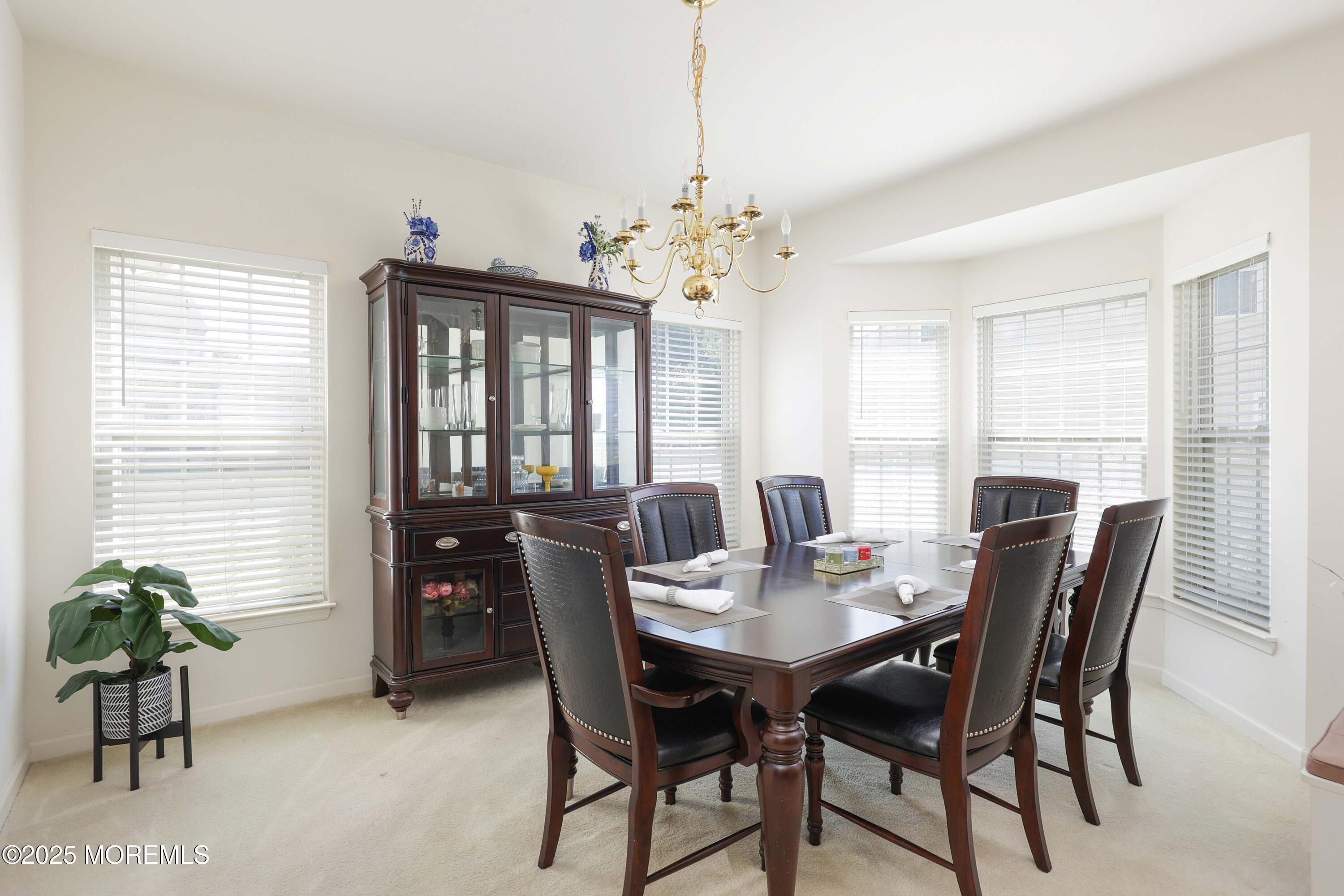 32 Firestone Drive Howell, NJ 07731 - Photo 9 of 43 a view of a dining room with furniture window and outside view