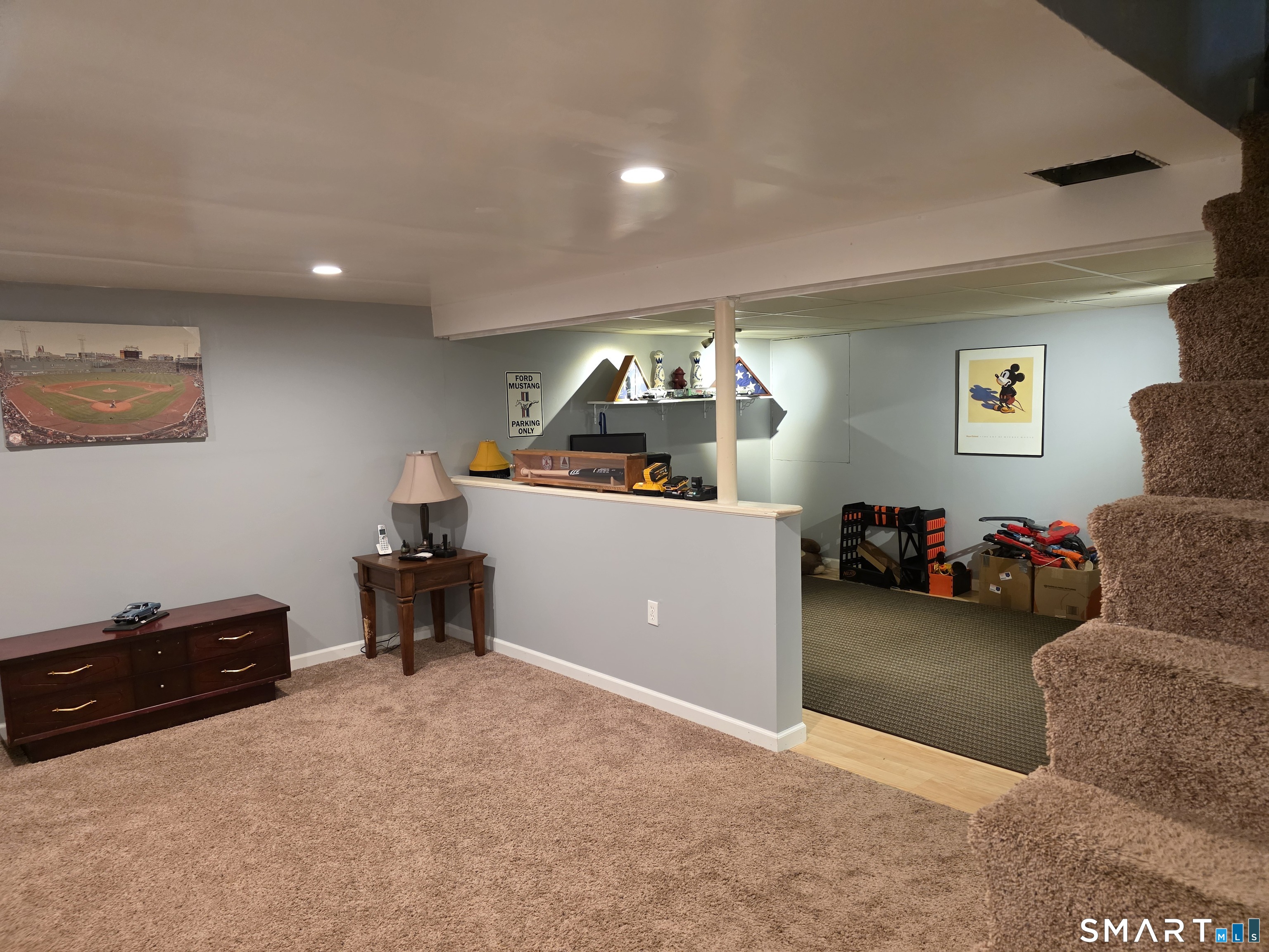 15 Van Buren Road Enfield, CT 06082 - Photo 30 of 40 a living room with furniture gym equipment and a window
