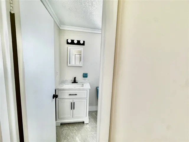 a view of cabinets and wooden floor