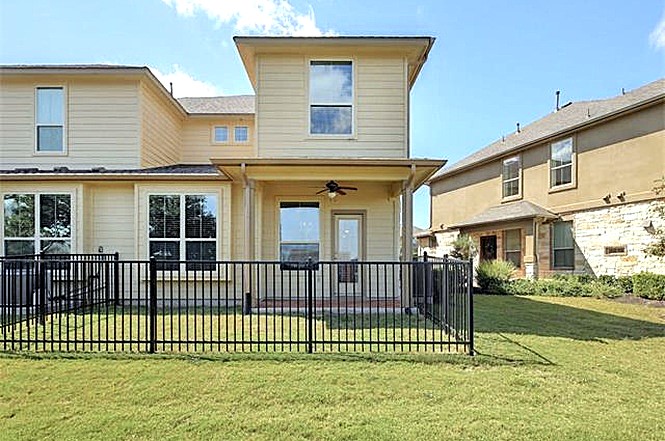 14001 Avery Ranch Boulevard, Unit 801 Austin, TX 78717 - Photo 21 of 26 A private, fenced backyard oasis perfect for outdoor relaxation and entertaining.