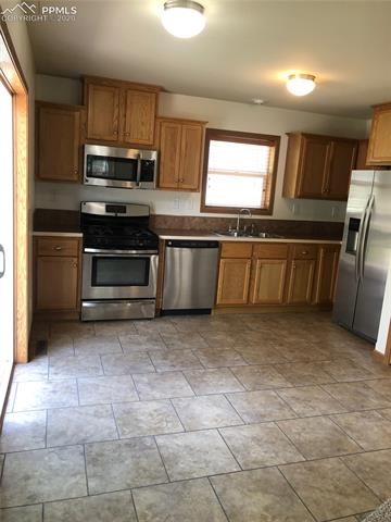 5875 Vessey Road Colorado Springs, CO 80908 - Photo 4 of 30 Gallery Image 4