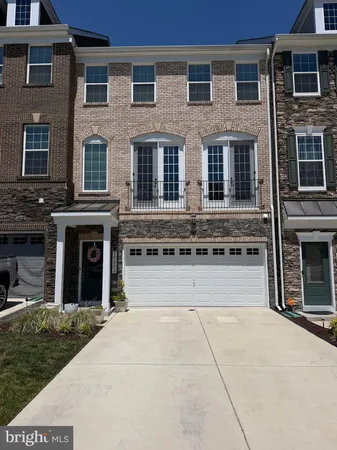 a view of a brick building with many windows