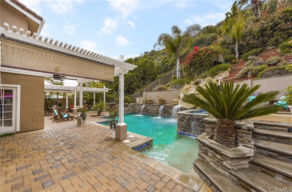 4224 San Ramon Drive Corona, CA 92882 - Photo 3 of 43 Custom pavers, patio covers and multiple entertaining areas.