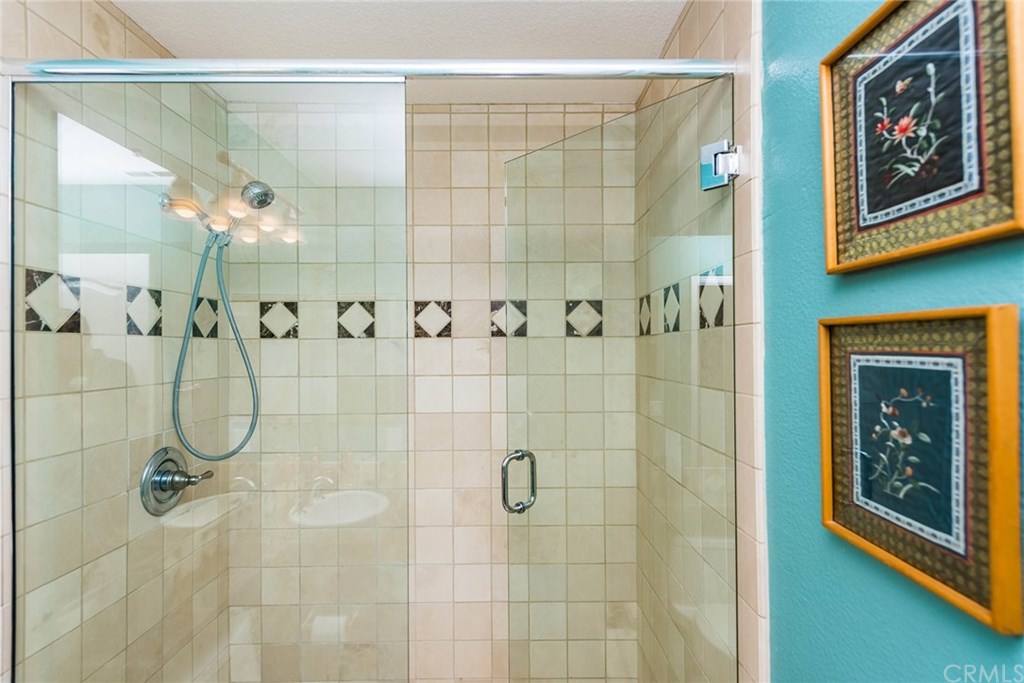 4224 San Ramon Drive Corona, CA 92882 - Photo 37 of 43 Beautiful downstairs bathroom with walk in shower. Adjacent to downstairs bedroom.