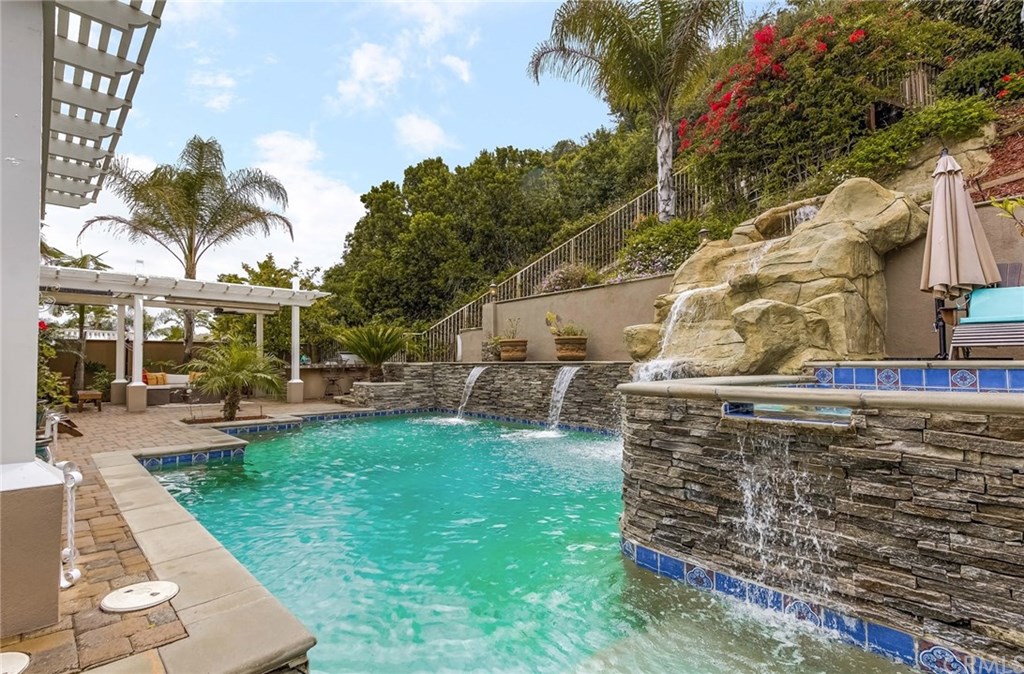 4224 San Ramon Drive Corona, CA 92882 - Photo 5 of 43 Pebble Tec / Salt Water Pool. Raised spa with decking. Multiple waterfalls !