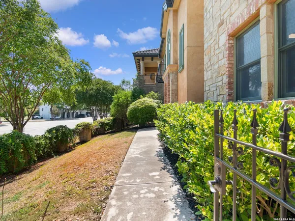 a view of a pathway with a building in the background