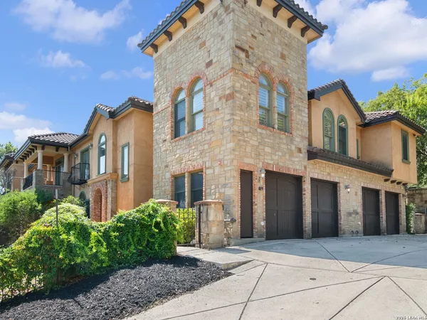 a front view of a building with yard