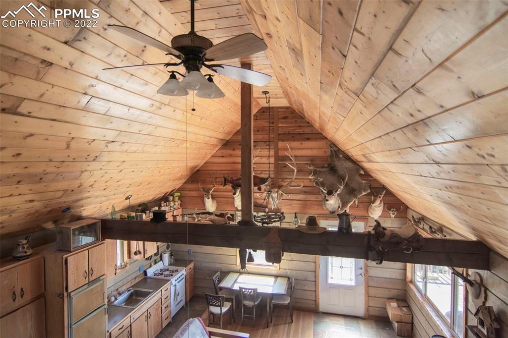 2126 E Path Cotopaxi, CO 81223 - Photo 4 of 34 a picture of table and chairs with wooden floor