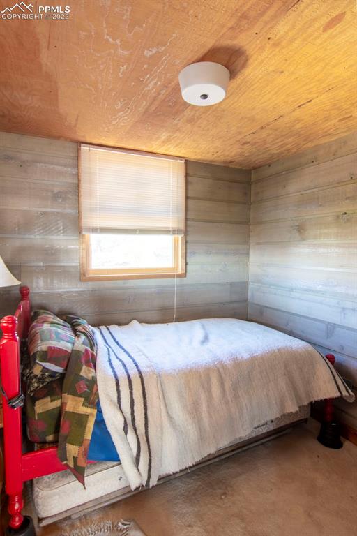 2126 E Path Cotopaxi, CO 81223 - Photo 10 of 34 a bedroom with a bed and a window