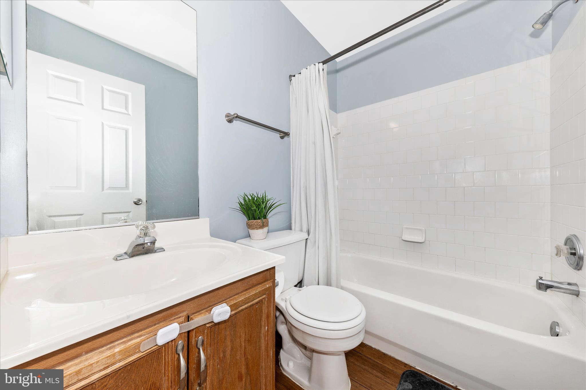 6107 Pine Ridge Terrace Frederick, MD 21701 - Photo 28 of 57 a bathroom with a sink a toilet and shower
