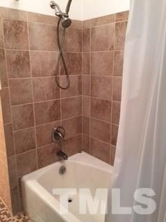 3901 Sue Lane Raleigh, NC 27604 - Photo 17 of 25 Hall bath with updated tile.