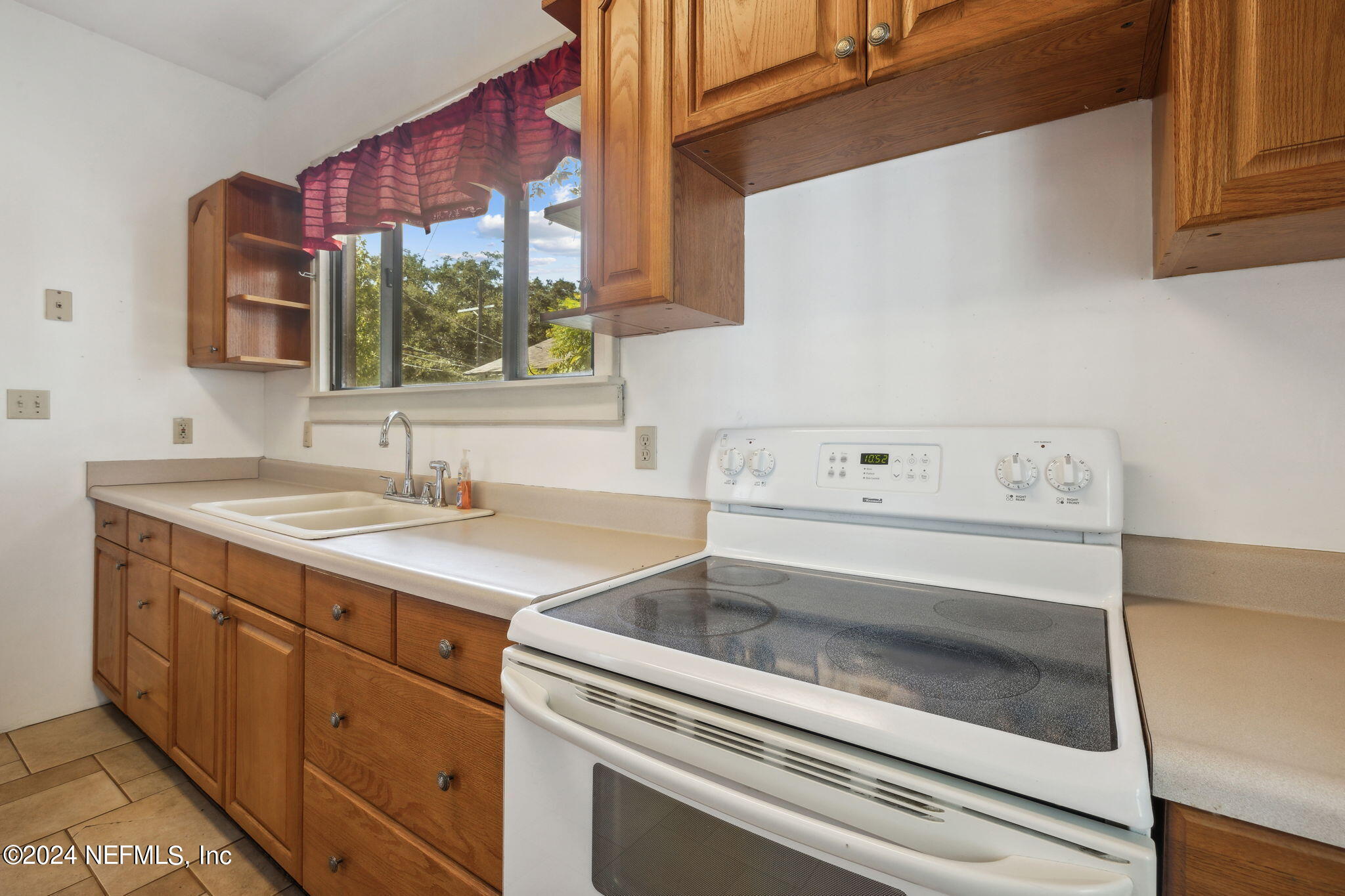 2887 Forbes Street Jacksonville, FL 32205 - Photo 13 of 35 a utility room with sink dryer and washer