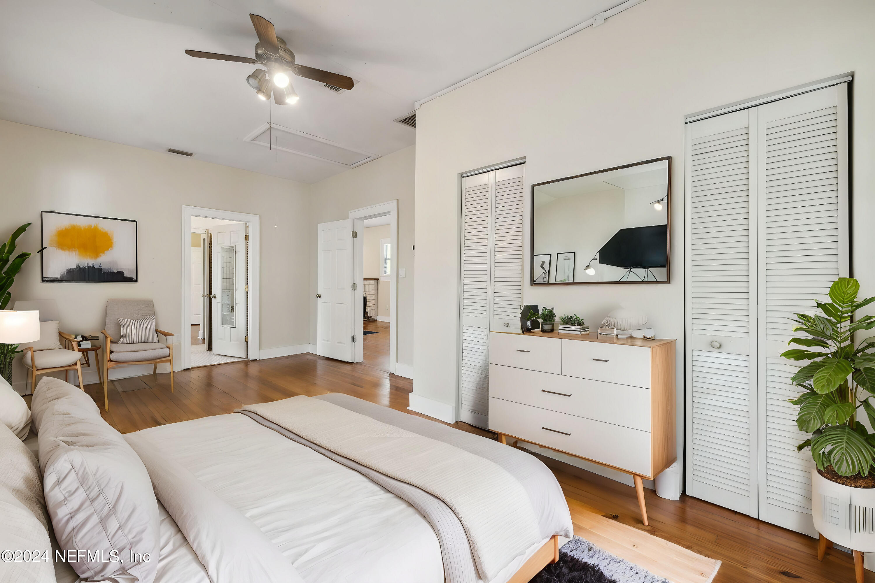 2887 Forbes Street Jacksonville, FL 32205 - Photo 15 of 35 a bedroom with a bed and a flat screen tv
