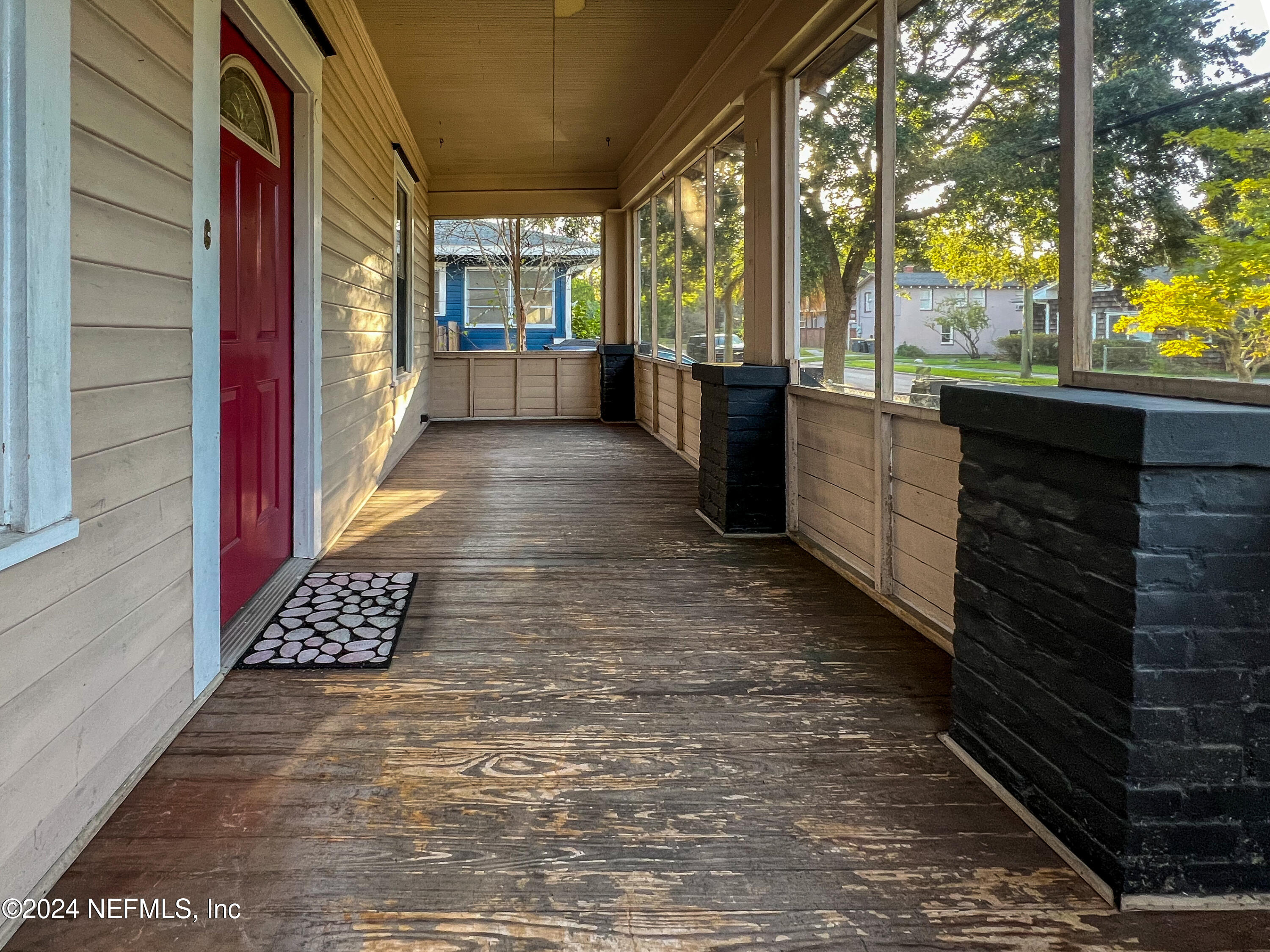 2887 Forbes Street Jacksonville, FL 32205 - Photo 2 of 35 a view of lobby with wooden floor and floor to ceiling window