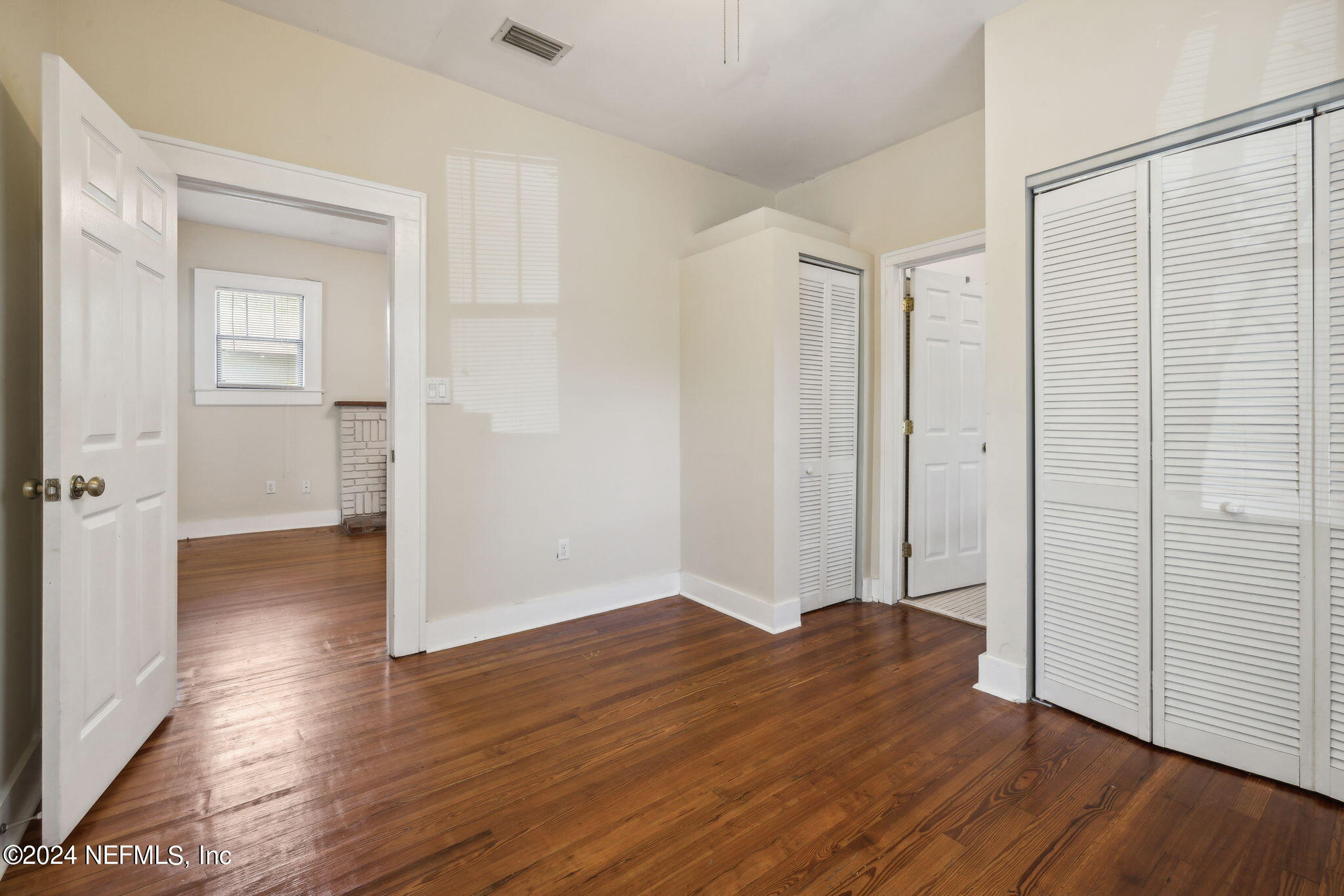 2887 Forbes Street Jacksonville, FL 32205 - Photo 23 of 35 wooden floor in an empty room