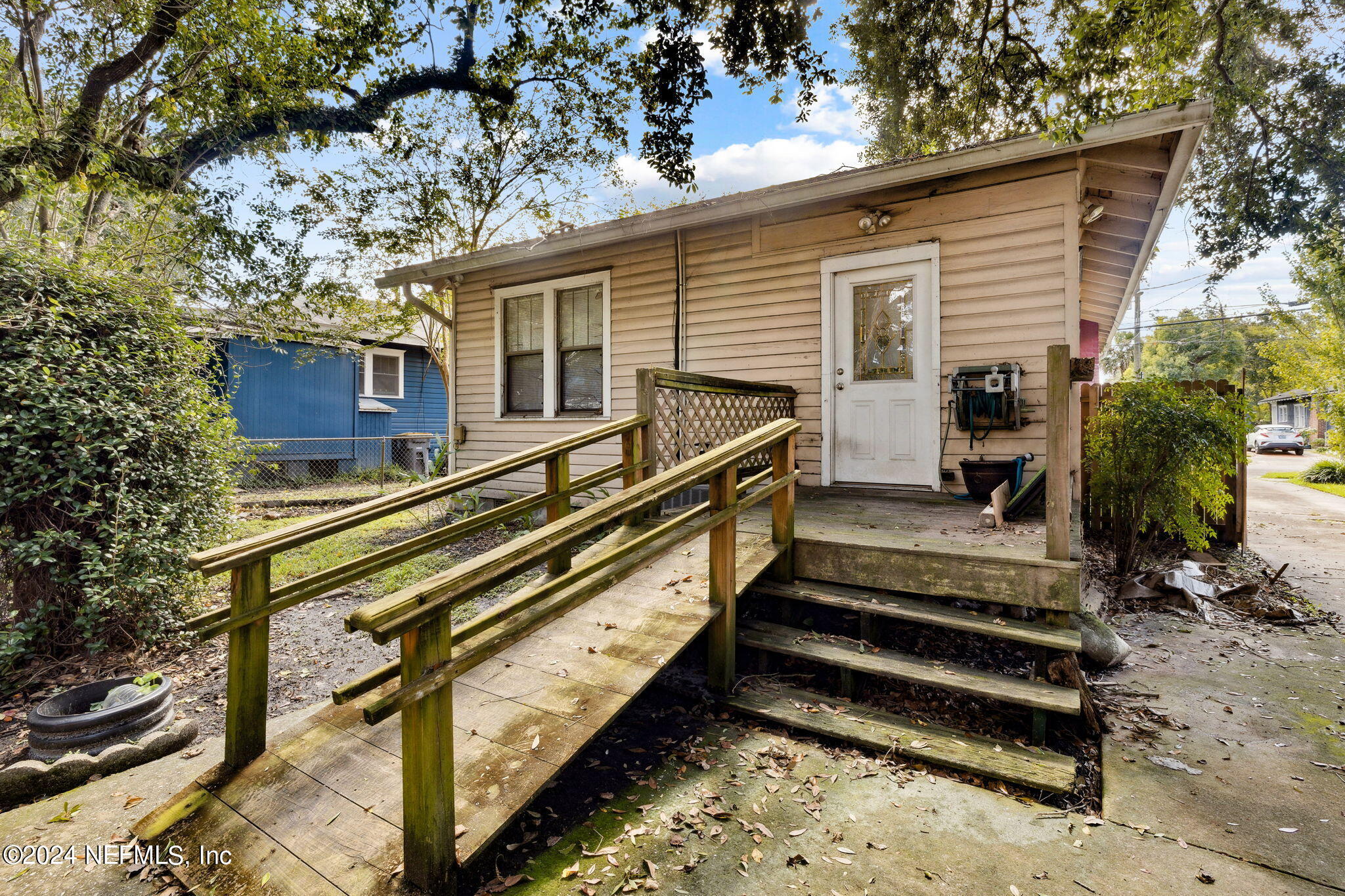 2887 Forbes Street Jacksonville, FL 32205 - Photo 25 of 35 a view of a house with a large window and wooden fence
