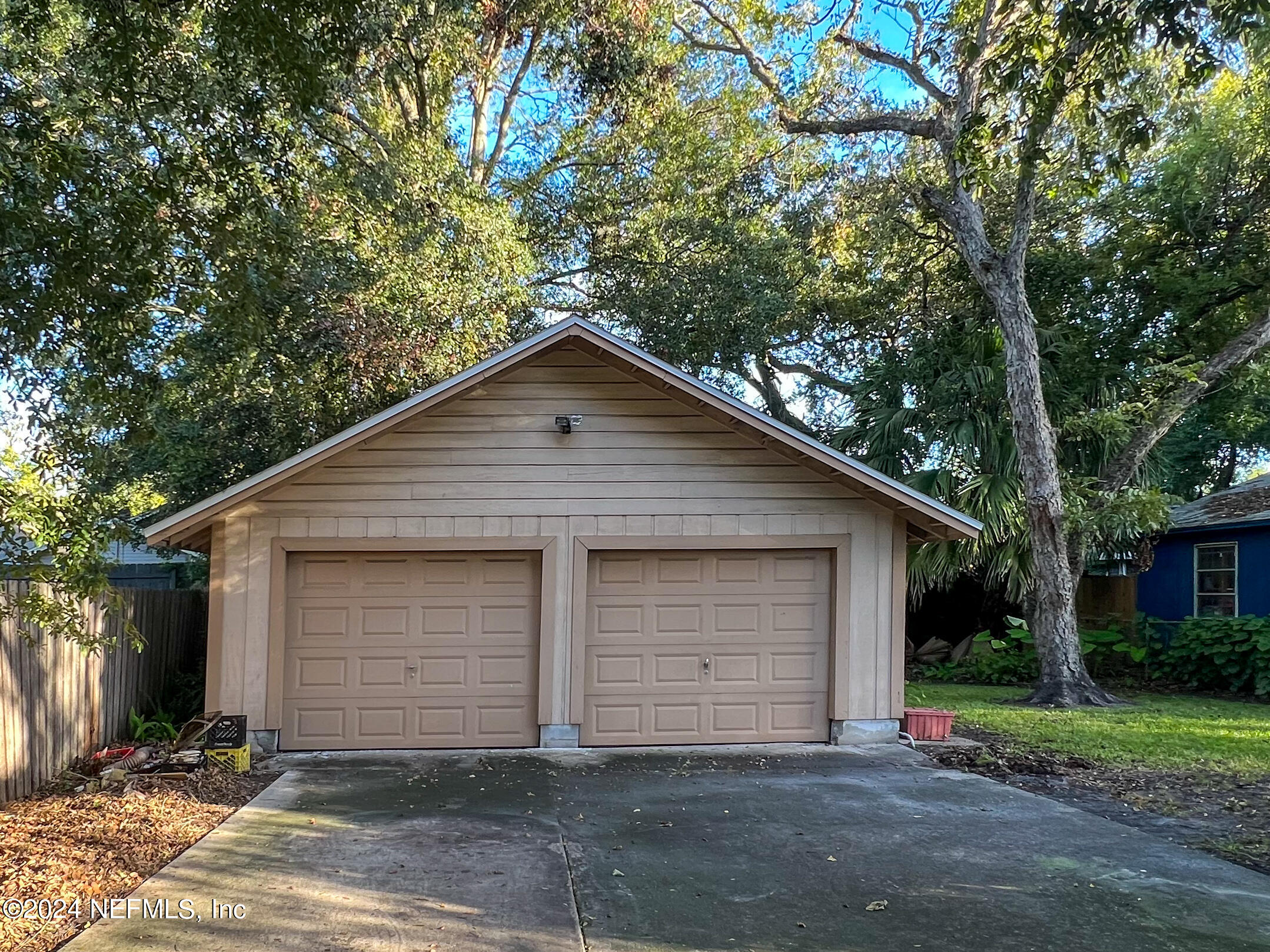2887 Forbes Street Jacksonville, FL 32205 - Photo 27 of 35 a front view of a house with garage