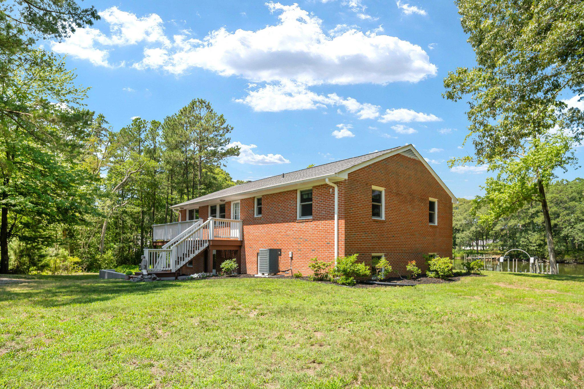 279 Harbor Drive Reedville, VA 22539 - Photo 64 of 97 Perfect blend of trees and lawn