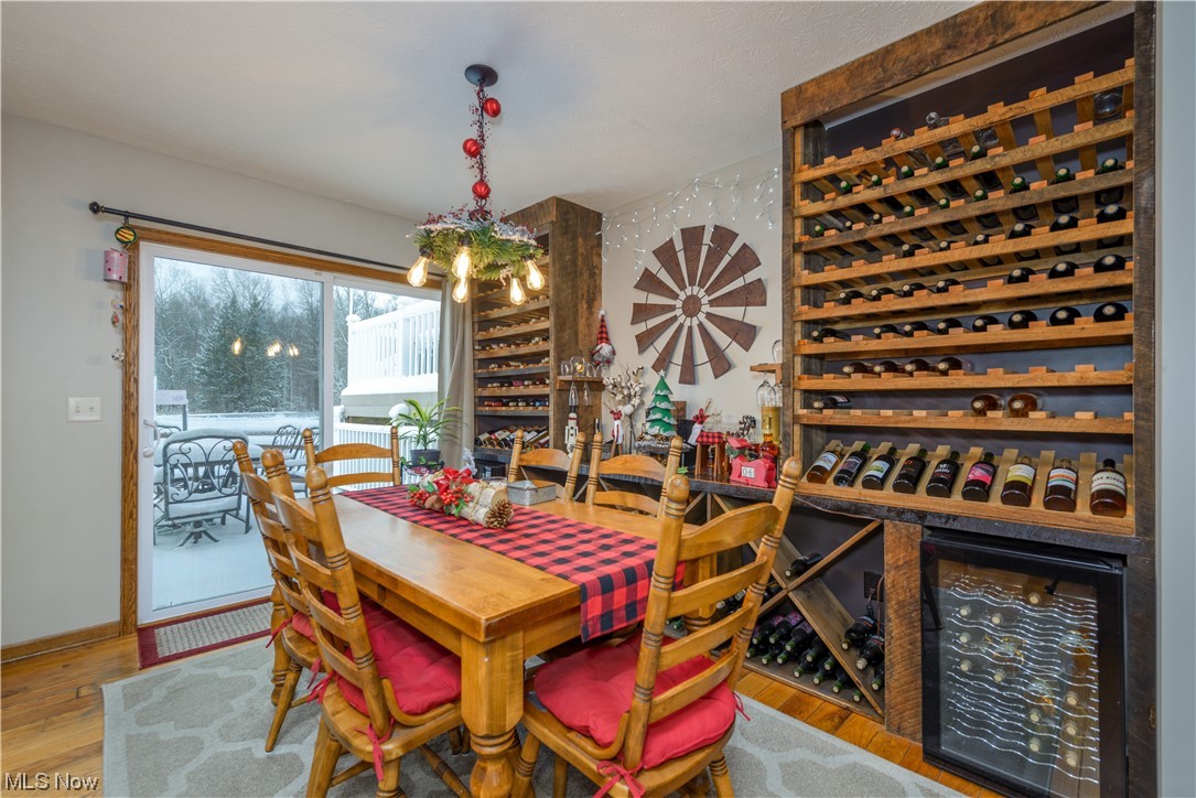 8646 Yale Road Rootstown, OH 44272 - Photo 4 of 30 Wine room with light hardwood / wood-style flooring