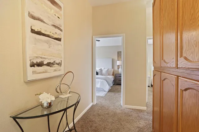 a view of living room with furniture and a window