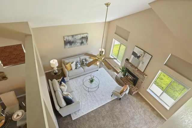 a view of entryway livingroom and hall with wooden floor