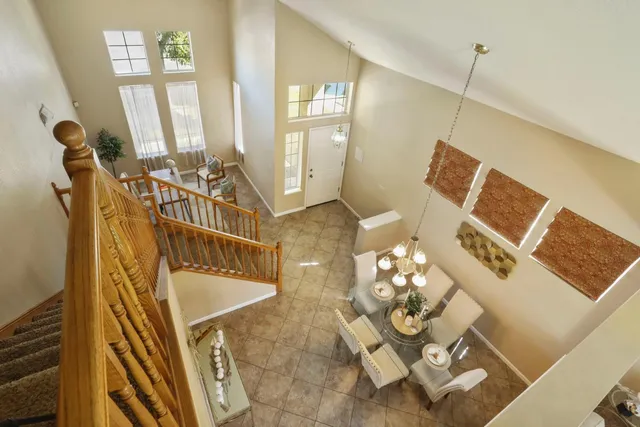 a view of a storage and utility room with washer and dryer