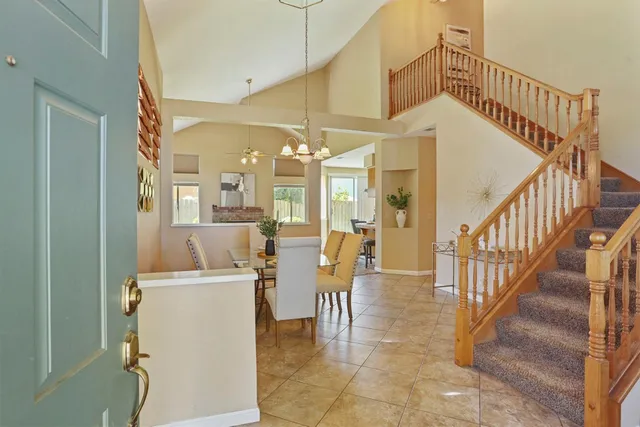 a dining room with furniture and a table