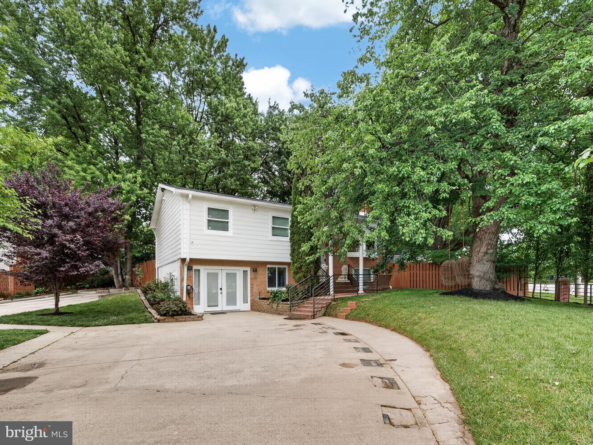 13427 Delaney Road Woodbridge, VA 22193 - Photo 45 of 57 front view of a house with a yard