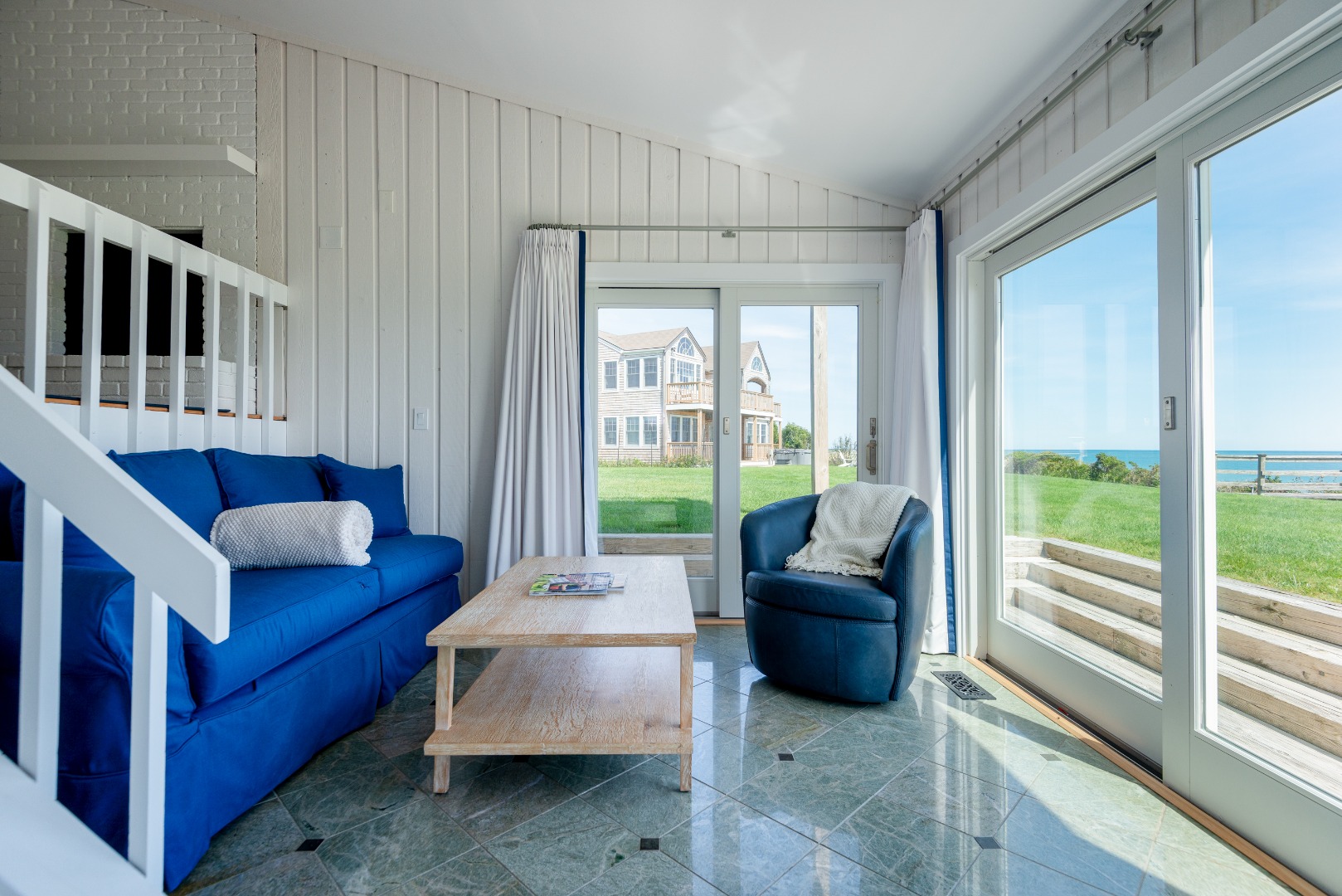 1 Reeds Way Nantucket, MA 02554 - Photo 46 of 51 a living room with furniture and a floor to ceiling window