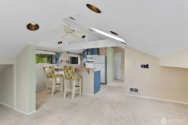 a view of a kitchen and a dining room