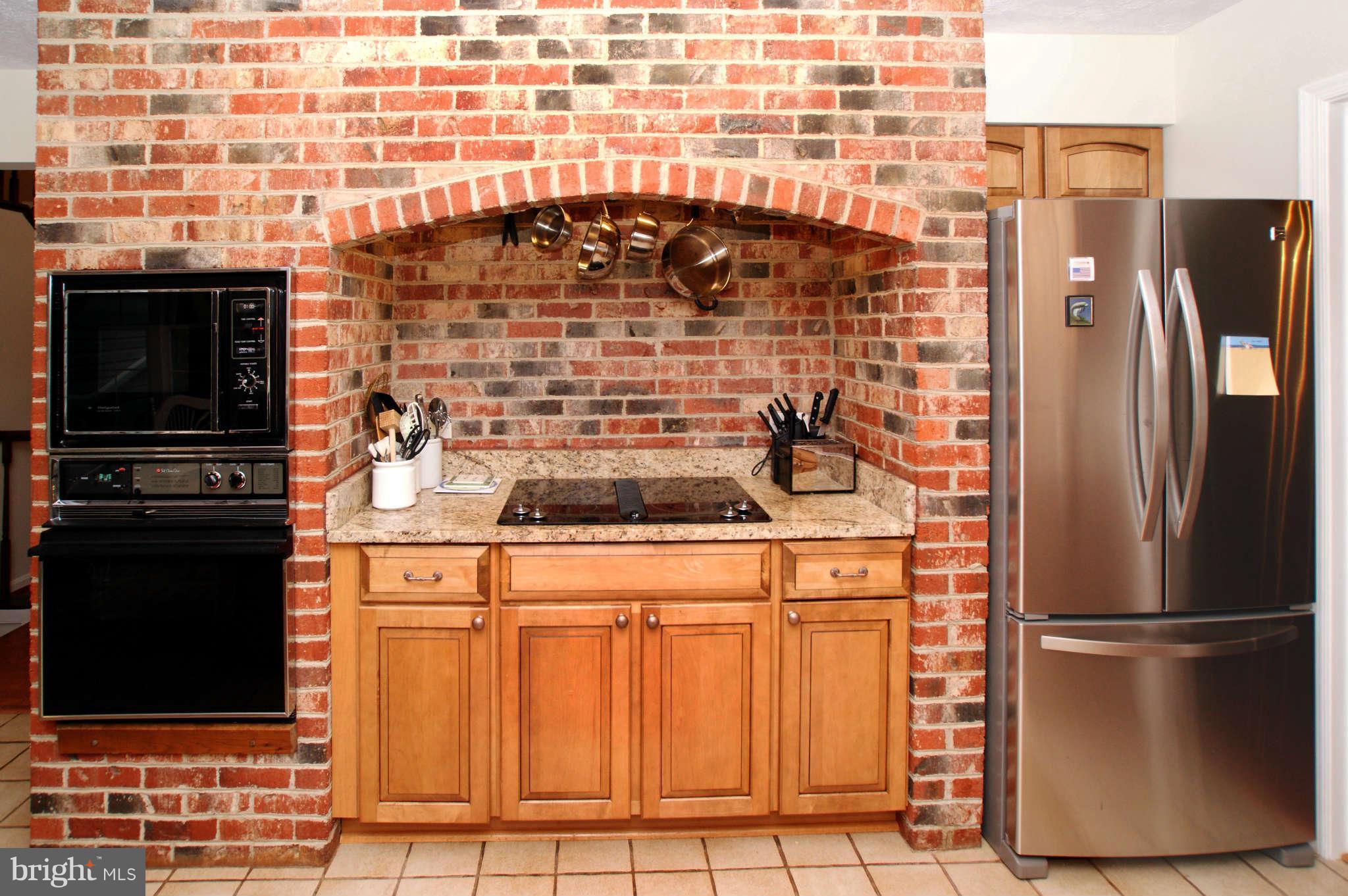 7415 Jenna Road Springfield, VA 22153 - Photo 9 of 30 Unique Brick surround Cooking Center