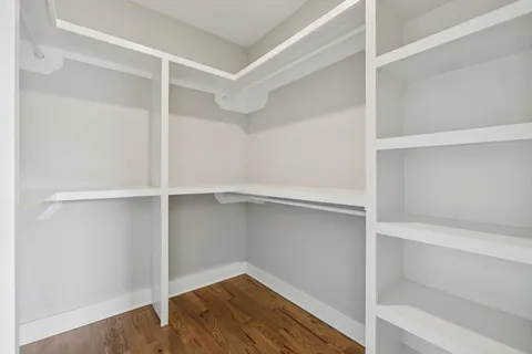 a view of an empty walk in closet