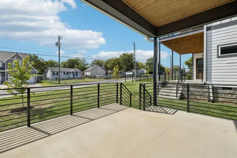a balcony with view of street