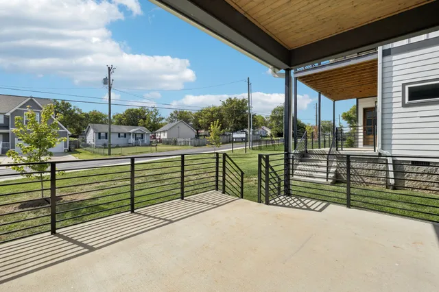 a balcony with view of street