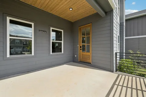 a front view of a house with a porch