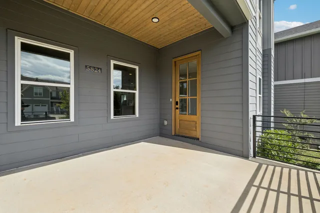 a front view of a house with a porch