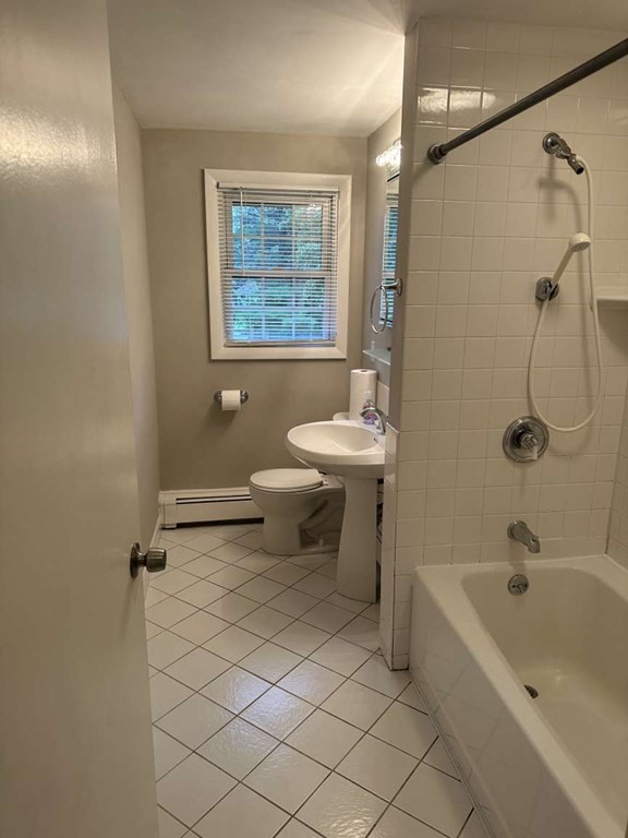 19 Merrill Drive Framingham, MA 01701 - Photo 9 of 18 a bathroom with a sink toilet and shower