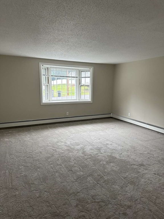 19 Merrill Drive Framingham, MA 01701 - Photo 10 of 18 an empty room with a window