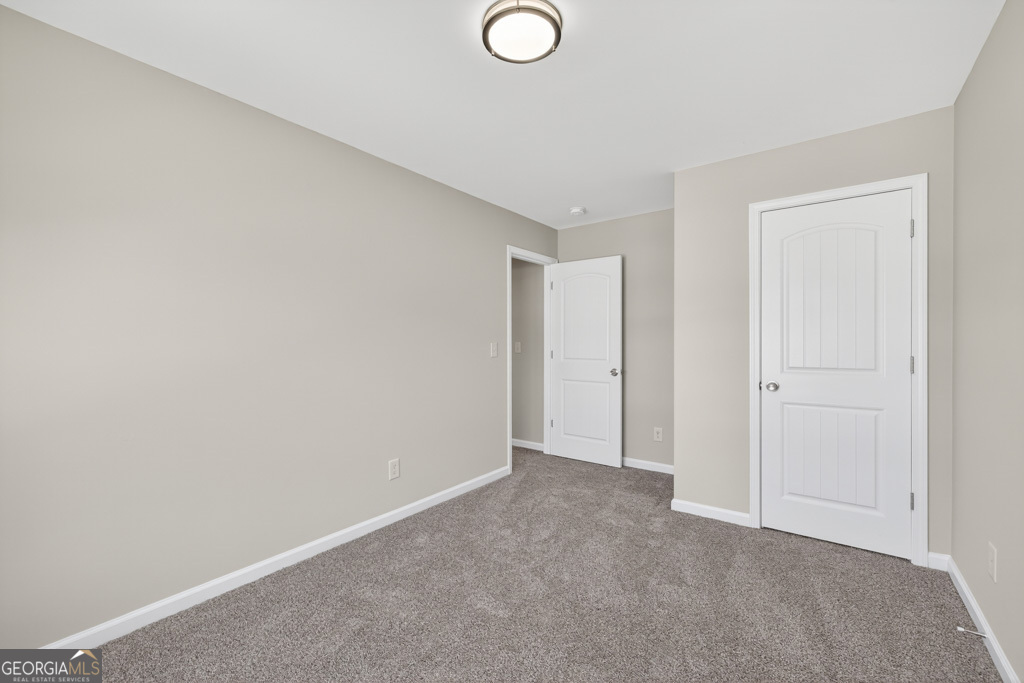 1734 Snapping Court Winder, GA 30680 - Photo 27 of 35 a view of an empty room