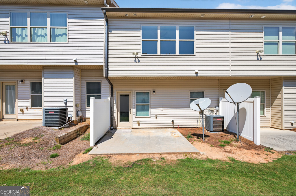 1734 Snapping Court Winder, GA 30680 - Photo 29 of 35 a front view of a house with backyard