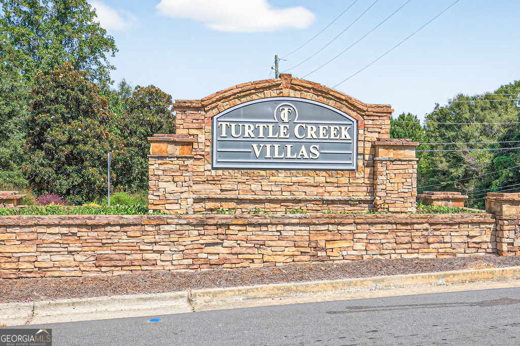 1734 Snapping Court Winder, GA 30680 - Photo 35 of 35 a view of a brick house with a small yard