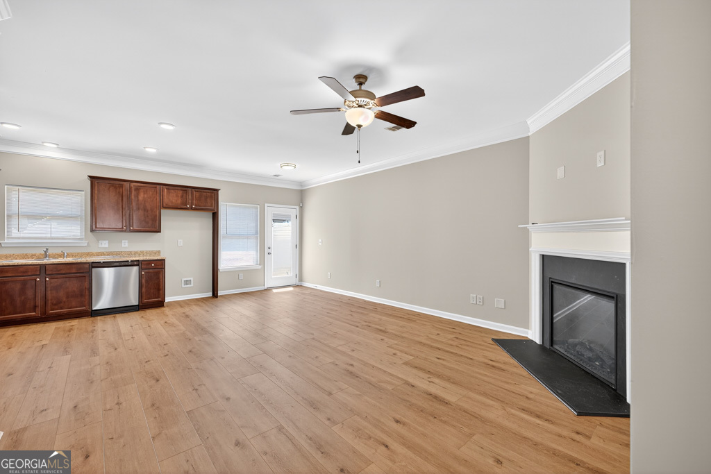1734 Snapping Court Winder, GA 30680 - Photo 4 of 35 a view of a kitchen with a sink and a kitchen view