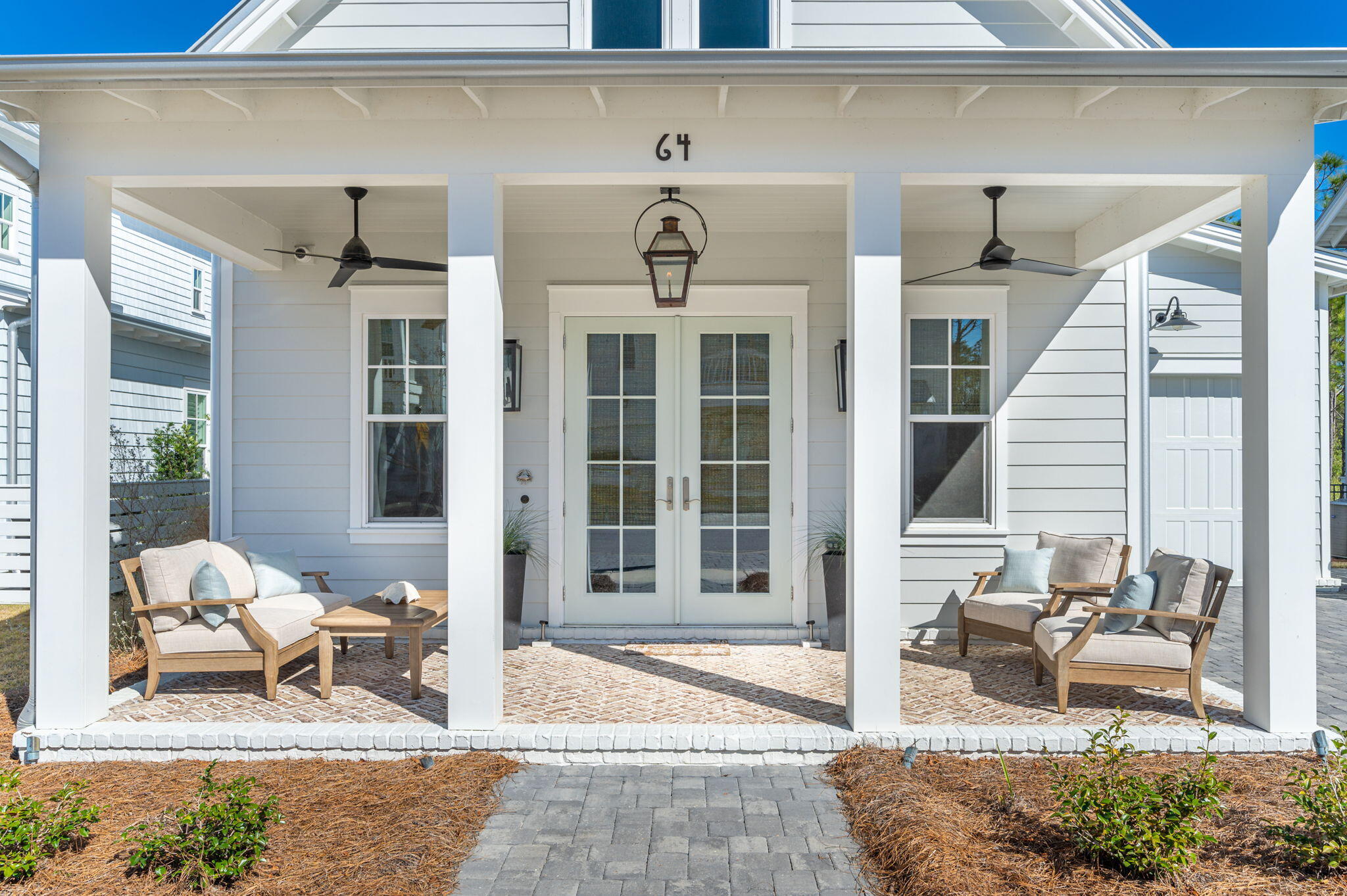 64 White Cottage Road Santa Rosa Beach, FL 32459 - Photo 3 of 28 a building outdoor space with patio furniture