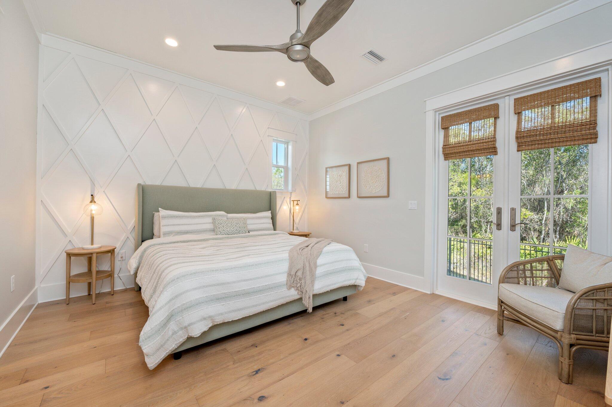 64 White Cottage Road Santa Rosa Beach, FL 32459 - Photo 8 of 28 a bedroom with a large bed and a couch