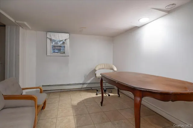 a kitchen with a refrigerator and a stove
