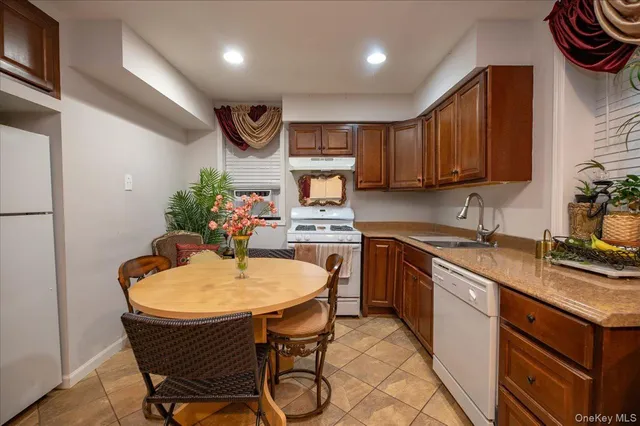 a kitchen with a stove and a sink