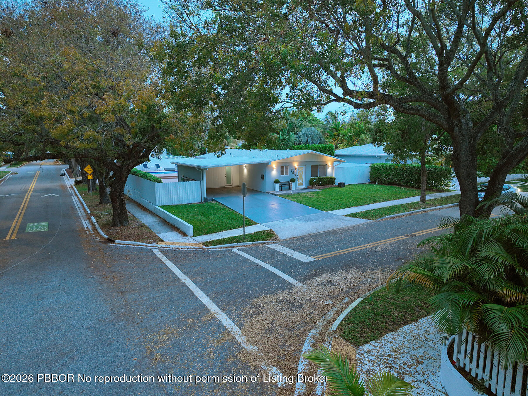 747 Avon Road West Palm Beach, FL 33401 - Photo 2 of 29 a view of a park with large trees