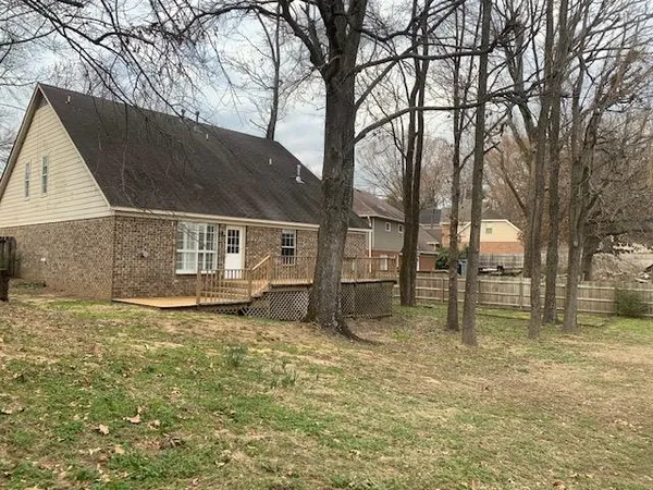 a bathroom with a bathtub and a sink